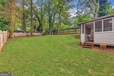 Don't miss this private retreat in the city! 3BR/2BA Mid-Century