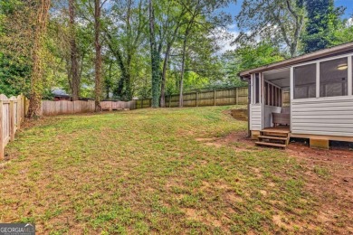 Don't miss this private retreat in the city! 3BR/2BA Mid-Century