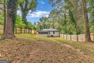 Don't miss this private retreat in the city! 3BR/2BA Mid-Century