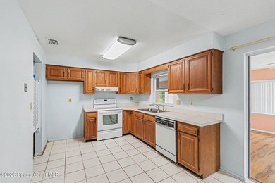 This solidly built Titusville home offers 1,891 square feet - photo 8