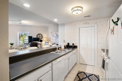 Walk-in from the Parking Lot! End Unit! Turn-Key! Great views of - photo 4