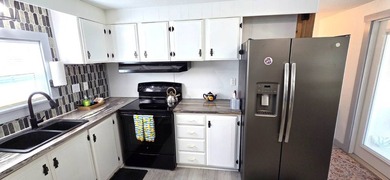 The Beach Home You've Been Waiting For! Welcome to this adorable - photo 4