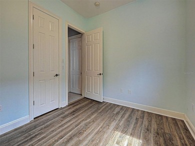Virtually Staged. Exquisite renovated home nestled in the gated - photo 44