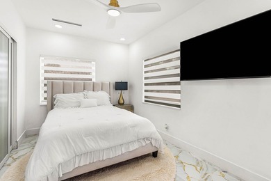 This beautifully updated and thoughtfully expanded 3-bedroom - photo 12