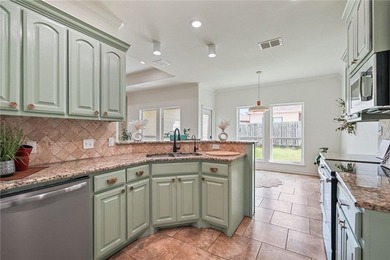 Tucked away on a quiet cul-de-sac in a gated community, this - photo 9