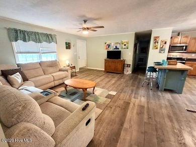 Beautiful 3-bedroom, 2-bath home offering 1,469+/- sq ft of - photo 2
