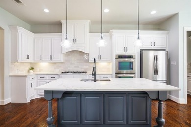 Located on a quiet no-through street in sought-after Twin Creeks