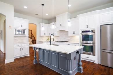 Located on a quiet no-through street in sought-after Twin Creeks