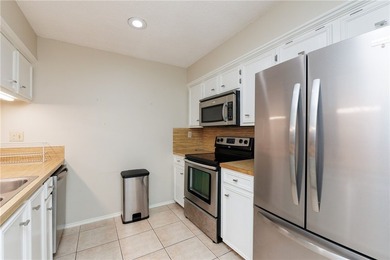 Welcome home to this charming townhome located in the sought - photo 7