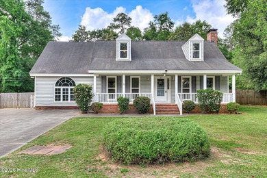 Home with in-ground pool on spacious lot near Jones Lake in - photo 2