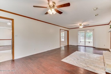 Home with in-ground pool on spacious lot near Jones Lake in - photo 7