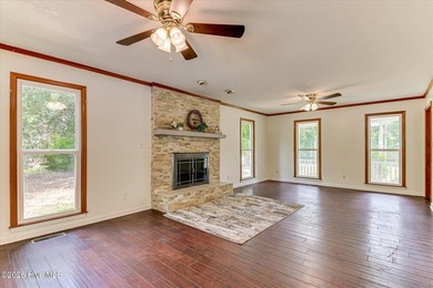 Home with in-ground pool on spacious lot near Jones Lake in - photo 9