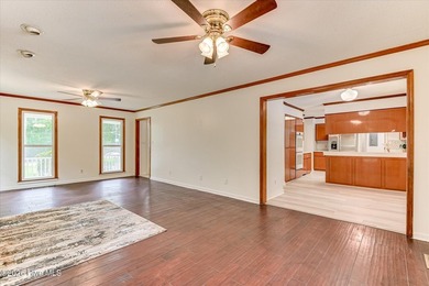 Home with in-ground pool on spacious lot near Jones Lake in - photo 10