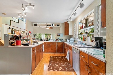 Nestled in a highly desirable Hawaii Kai neighborhood, this - photo 11