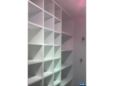 Welcome to this spacious two-bedroom residence at The Greenhouse