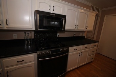 Tucked away in a quiet, private setting, this move-in-ready home - photo 12
