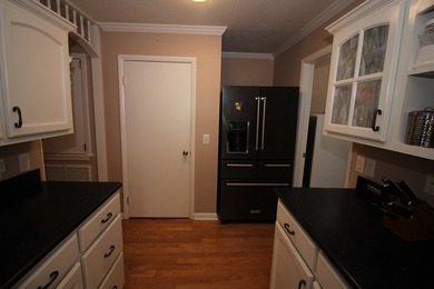 Tucked away in a quiet, private setting, this move-in-ready home - photo 13