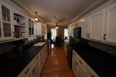 Tucked away in a quiet, private setting, this move-in-ready home - photo 14