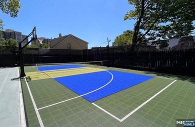 Welcome to this spacious two-bedroom residence at The Greenhouse