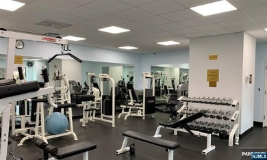 Welcome to this spacious two-bedroom residence at The Greenhouse