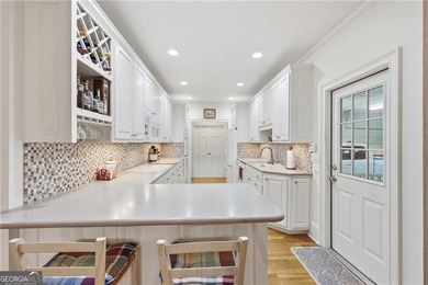 Well-designed and thoughtfully curated, this inviting condo just