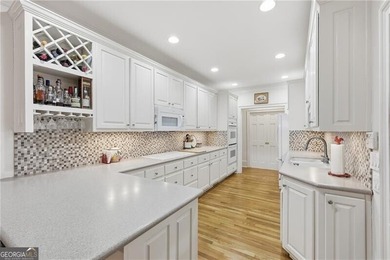 Well-designed and thoughtfully curated, this inviting condo just