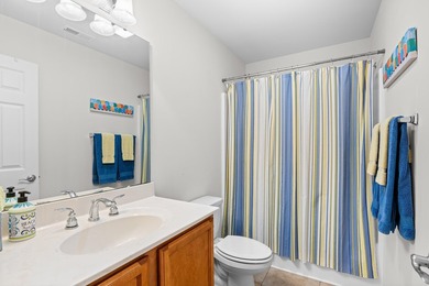 This 3 bed/2 bath charming coastal cottage is nestled within The - photo 26
