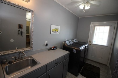 Tucked away in a quiet, private setting, this move-in-ready home - photo 32