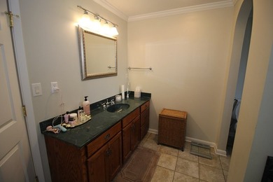 Tucked away in a quiet, private setting, this move-in-ready home - photo 45