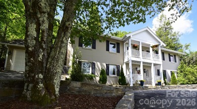 Just a three-minute drive from downtown Blowing Rock, this home - photo 1
