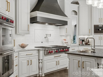Situated within the prestigious guard-gated community of - photo 11