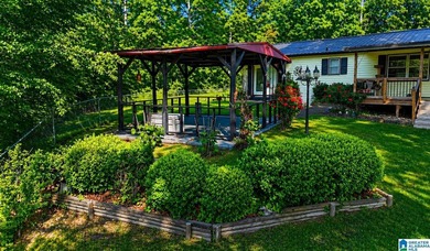Enjoy waterfront living with this lovely stick-built home that - photo 24