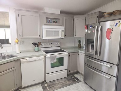 This completely upgraded home makes entertaining a delight with - photo 4