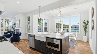 Welcome to The Townes at Ketchaponack in Westhampton Beach, a - photo 6