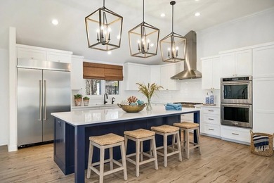 Don't miss out on this beautifully renovated home on open water - photo 3