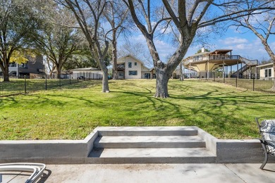 Don't miss out on this beautifully renovated home on open water - photo 9