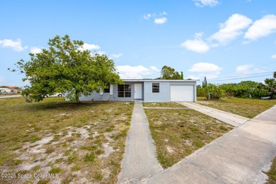 Discover this charming corner-lot home, freshly painted and - photo 1