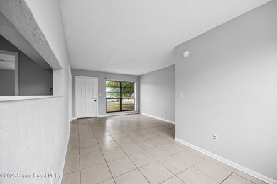Discover this charming corner-lot home, freshly painted and - photo 6
