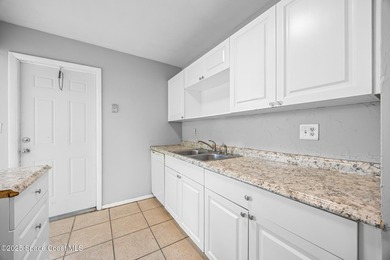 Discover this charming corner-lot home, freshly painted and - photo 8