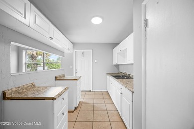 Discover this charming corner-lot home, freshly painted and - photo 9