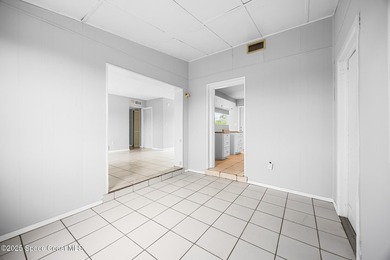 Discover this charming corner-lot home, freshly painted and - photo 10