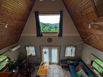 Private A-frame cabin on 3.42 acres + Bear Creek! Located in - photo 12