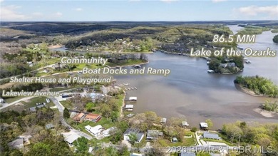Located at the 86.5MM of the Lake of the Ozarks, this recently - photo 18