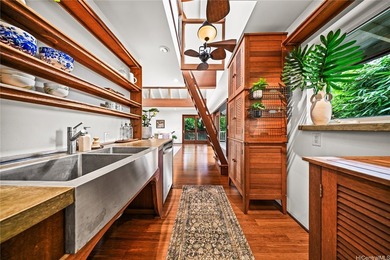 Tucked within a canopy of mature fruit trees and lush tropical - photo 20