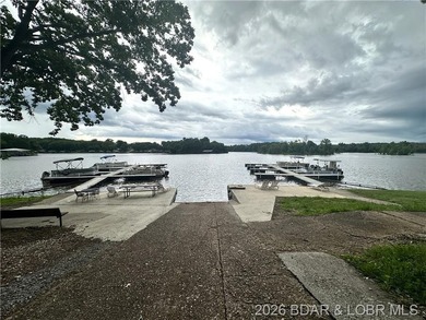 Located at the 86.5MM of the Lake of the Ozarks, this recently - photo 20