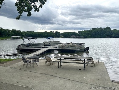 Located at the 86.5MM of the Lake of the Ozarks, this recently - photo 21
