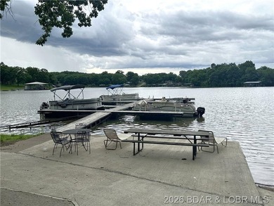 Located at the 86.5MM of the Lake of the Ozarks, this recently - photo 21
