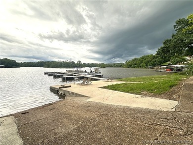 Located at the 86.5MM of the Lake of the Ozarks, this recently - photo 22
