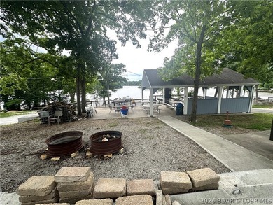 Located at the 86.5MM of the Lake of the Ozarks, this recently - photo 23