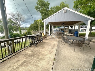 Located at the 86.5MM of the Lake of the Ozarks, this recently - photo 29